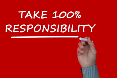 Take 100percentage responsibility reminder note written on a red cover background.