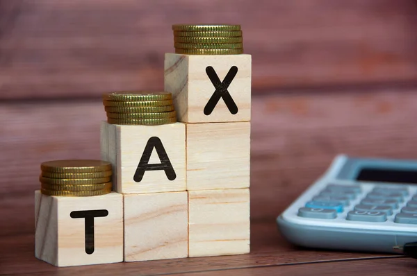 Tax Word Wooden Blocks Gold Coins Top Calculator Background Tax — Fotografia de Stock