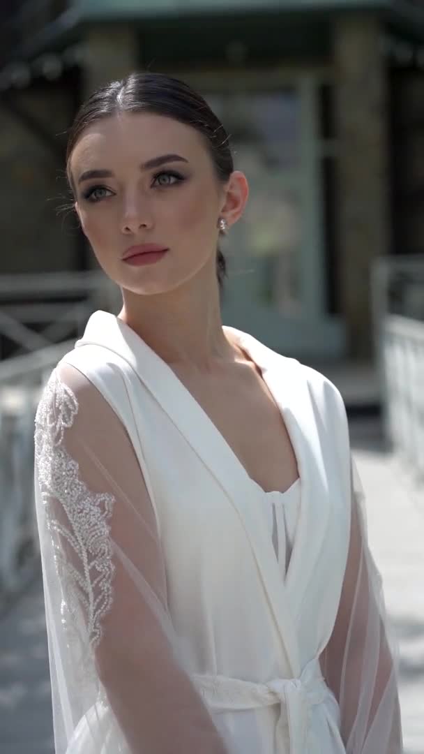 Beautiful Vertical Clip Young Woman Beautiful Wedding Gown Posing Camera — Stock Video