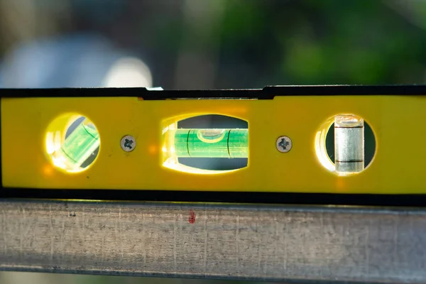 Spirit level or construction water level on steel pipe