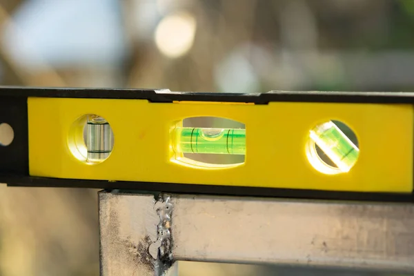 Spirit level or construction water level on steel pipe