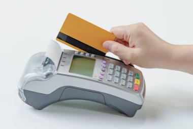 Credit card payment with EDC machine or credit card terminal.