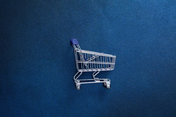 Empty Shopping Trolley Dark Blue Background Shop Basket Products —  Fotos de Stock