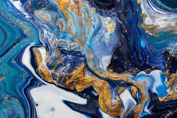Luxury abstract fluid art painting background. Spilled blue, white and gold acrylic paint.