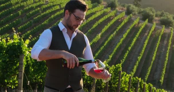 Young Man Tasting Red Wine Vineyard Sunset Successful Male Winemaker — 图库视频影像