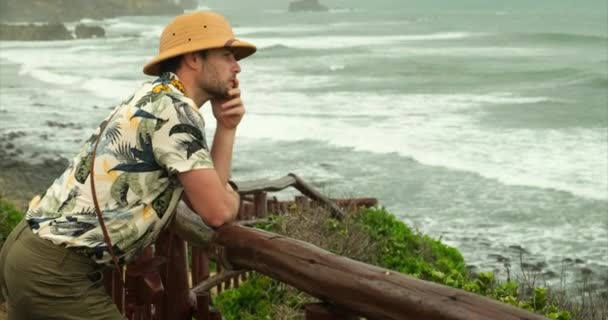 Man Traveler Backpack Holding Hat Looking Amazing Mountains Sea Wanderlust — Wideo stockowe
