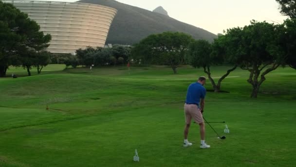 Golfer Hitting Ball Club Beatuiful Golf Course Smiling African American — Stock Video