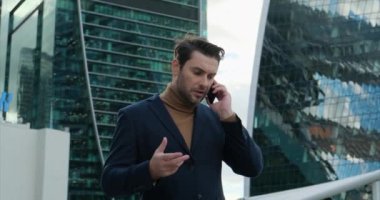 businessman talking on the phone. caucasian man angry, frustrated and furious with his mobile phone, angry with customer service. Business man professional employee calling customer service support.