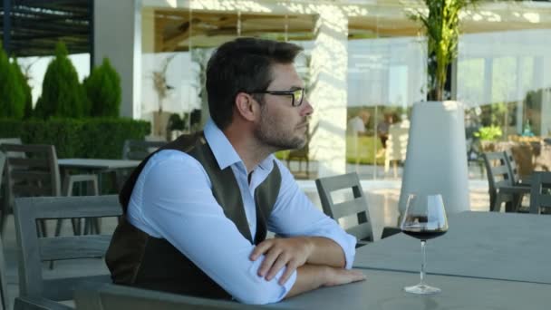 Pensive Man Looking Wine Glass Table Man White Shirt Bad — 图库视频影像