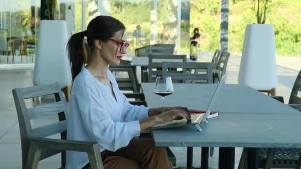 Coworking Freelance Concept Girl White Shirt Sits Laptop Glass Wine — Video Stock