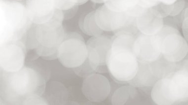 Aydınlatılmış beyaz bokeh resmi arkaplan illüstrasyonu olarak kullanılabilir veya metin eklenebilir.