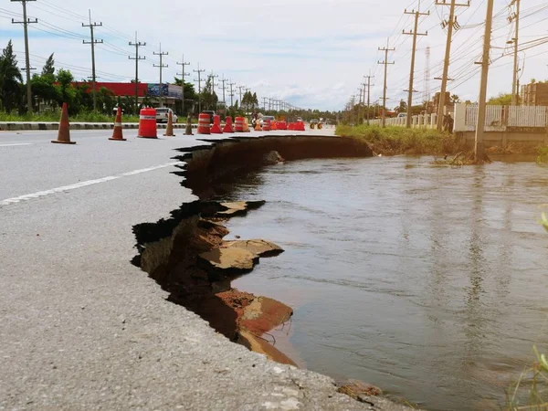 Natural Flood Disasters Have Damaged Road Surfaces Damaged Road Surfaces Stock Image