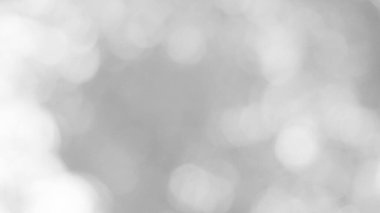 Aydınlatılmış beyaz bokeh resmi arkaplan illüstrasyonu olarak kullanılabilir veya metin eklenebilir.