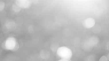 Aydınlatılmış beyaz bokeh resmi arkaplan illüstrasyonu olarak kullanılabilir veya metin eklenebilir.