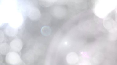 The illuminated white bokeh image can be used as a background illustration or add text. clipart