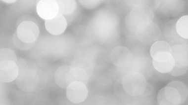 Aydınlatılmış beyaz bokeh resmi arkaplan illüstrasyonu olarak kullanılabilir veya metin eklenebilir.