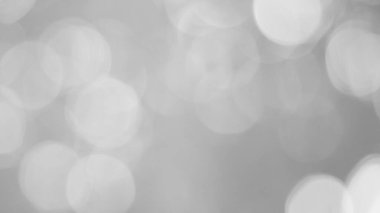 Aydınlatılmış beyaz bokeh resmi arkaplan illüstrasyonu olarak kullanılabilir veya metin eklenebilir.