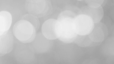 Aydınlatılmış beyaz bokeh resmi arkaplan illüstrasyonu olarak kullanılabilir veya metin eklenebilir.