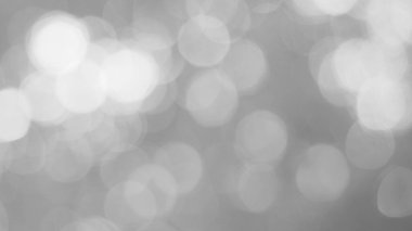 Aydınlatılmış beyaz bokeh resmi arkaplan illüstrasyonu olarak kullanılabilir veya metin eklenebilir.