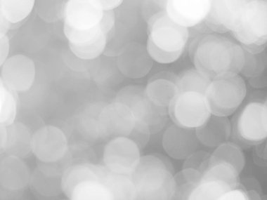 Aydınlatılmış beyaz bokeh resmi arkaplan illüstrasyonu olarak kullanılabilir veya metin eklenebilir.