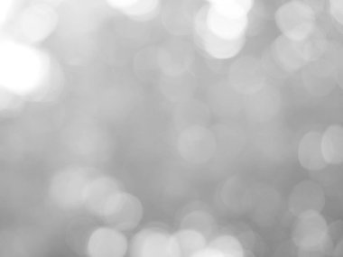 Aydınlatılmış beyaz bokeh resmi arkaplan illüstrasyonu olarak kullanılabilir veya metin eklenebilir.