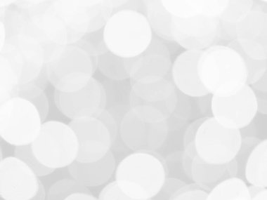 Aydınlatılmış beyaz bokeh resmi arkaplan illüstrasyonu olarak kullanılabilir veya metin eklenebilir.