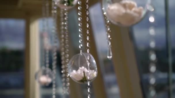 Rhinestones or crystals on string garland. Decoration, sky at background. — 图库视频影像