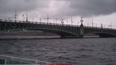 Sailing passenger touristic ship in a city. Lifebuoy, red inflatable ring.