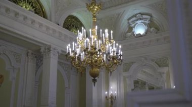 SAINT-PETERSBURG, RUSSIA - JUNE, 11, 2021: Interior light lamps luxury chandelier. 