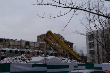 destroyed multi-storey residential building in the city