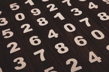 Rakamların geçmişi. Sıfırdan dokuza kadar. Sayıların dokusu. Mali veri kavramı. Matematik. Sayılarla kusursuz desen. finansal kriz konsepti. İş başarısı.