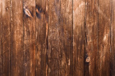 Düğümlü ve tırnak delikli klasik kahverengi ahşap arka plan dokusu. Eski boyalı ahşap duvar. Ahşap koyu yatay tahtalar