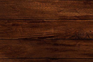 Çizikleri olan eski ahşap bir doku. kahverengi yaşlı ağaç arkaplanı.