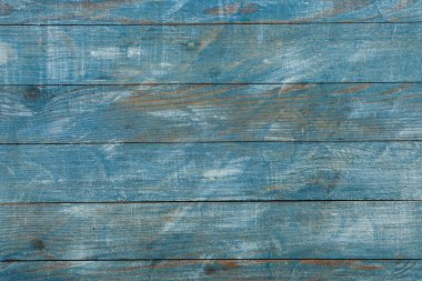 Çizikleri olan eski ahşap bir doku. kahverengi yaşlı ağaç arkaplanı.