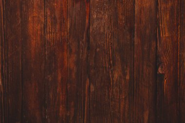 Düğümlü ve tırnak delikli klasik kahverengi ahşap arka plan dokusu. Eski boyalı ahşap duvar. Kahverengi soyut arka plan. Klasik, koyu renk, yatay tahtalar. Kopyalama alanı ile ön görünüm.