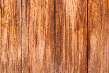 Düğümlü ve tırnak delikli klasik kahverengi ahşap arka plan dokusu. Eski boyalı ahşap duvar. Kahverengi soyut arka plan. Klasik, koyu renk, yatay tahtalar. Kopyalama alanı ile ön görünüm.