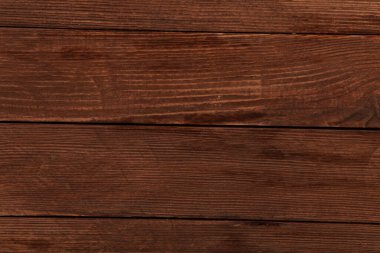 Düğümlü ve tırnak delikli klasik kahverengi ahşap arka plan dokusu. Eski boyalı ahşap duvar. Kahverengi soyut arka plan. Klasik, koyu renk, yatay tahtalar. Kopyalama alanı ile ön görünüm.