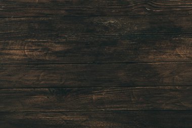 Düğümlü ve tırnak delikli klasik kahverengi ahşap arka plan dokusu. Eski boyalı ahşap duvar. Kahverengi soyut arka plan. Klasik, koyu renk, yatay tahtalar. Kopyalama alanı ile ön görünüm