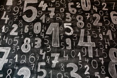 Rakamların geçmişi. Sıfırdan dokuza kadar. Sayıların dokusu. Mali veri kavramı. Matematik. Sayılarla kusursuz desen. finansal kriz konsepti. İş başarısı.