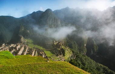Wonder of the World Machu Picchu in Peru. Beautiful landscape in Andes Mountains with Incan sacred city ruins. 