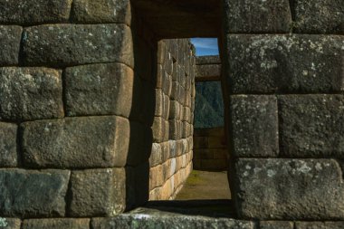Wonder of the World Machu Picchu in Peru. Beautiful landscape in Andes Mountains with Incan sacred city ruins. 