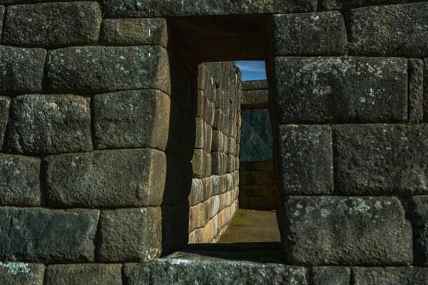 Wonder of the World Machu Picchu in Peru. Beautiful landscape in Andes Mountains with Incan sacred city ruins. 