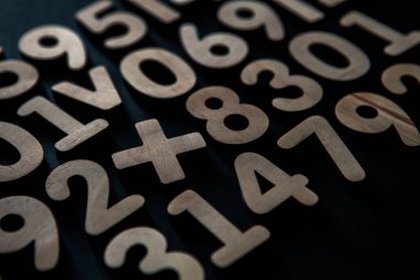 Colorful wooden numbers background. Numbers texture abstraction. Global economy crisis concept 
