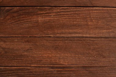 Düğümlü ve tırnak delikli klasik ahşap arka plan dokusu. Eski boyalı ahşap duvar. Ahşap, koyu renk yatay tahtalar. Kopyalama alanı ile ön görünüm. 