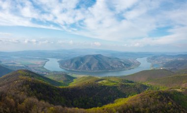 Spectacular panoramic view of danube bend from Predikaloszek lookout point. This region of Hungary is touristically very significant. Domos and Visegrad at the background. Spring landscape.