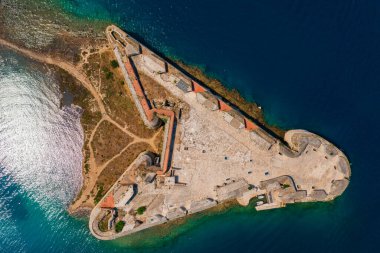 Aerial top down view about St. Nicholas Fortress which is a fortress located at the entrance to St. Anthony Channel, near the town of Sibenik in central Dalmatia, Croatia.