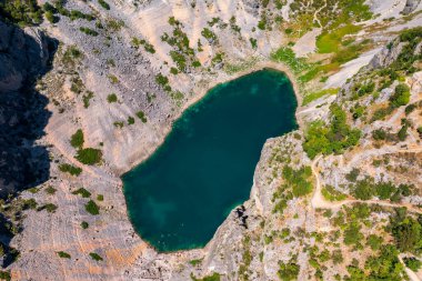 Aerial view about Blue Lake (Croatian: Modro jezero or Plavo jezero) is a karst lake located near Imotski in southern Croatia.