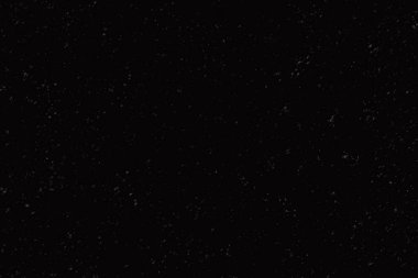 Siyah arkaplanda kar taneleri.