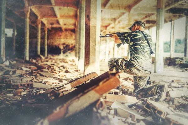 Airsoft svintageier in the vintage industry building. Old photo effect. — Stockfoto