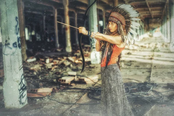 Beautiful shamanic girl in the vintage industry building. Old photo effect. — Stock Photo, Image